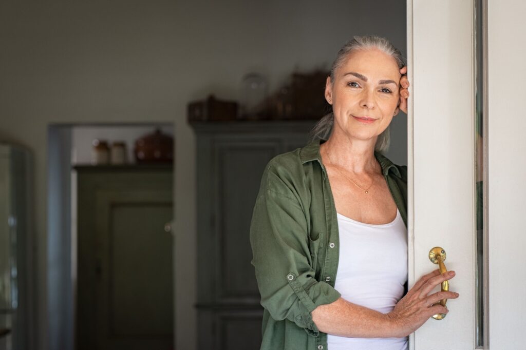 Serious but smiling mature woman