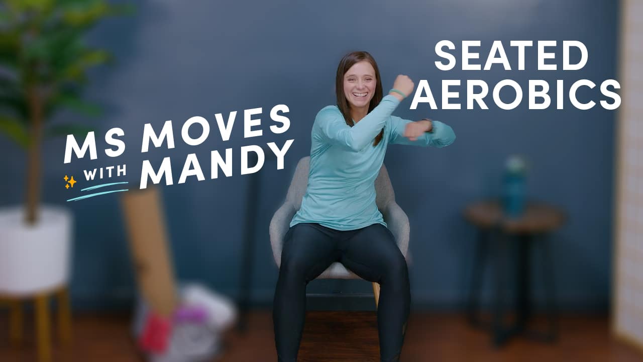 Physical therapist demonstrating a seated stretch