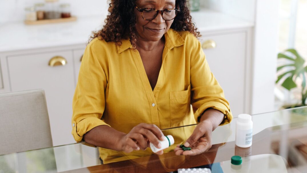 Woman taking medication