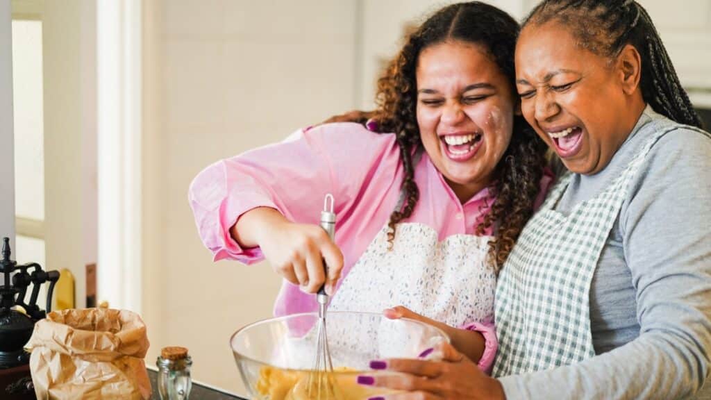 mother and daughter baking together