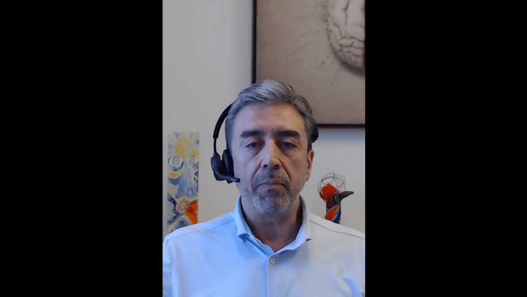 Dr. Gabriel Pardo sitting in his office