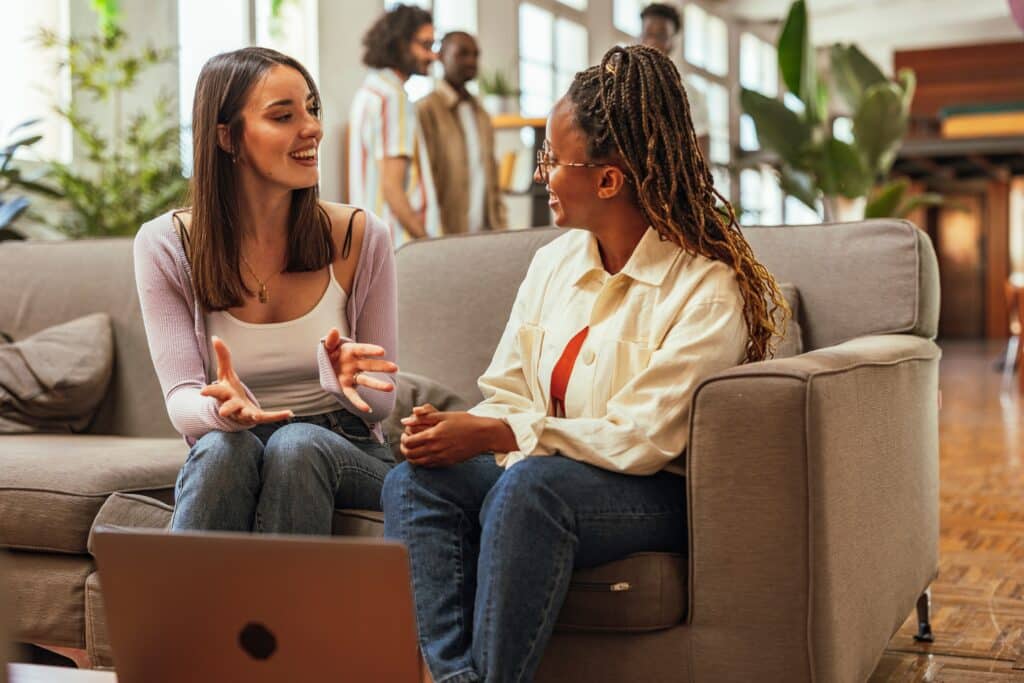 two young women talking