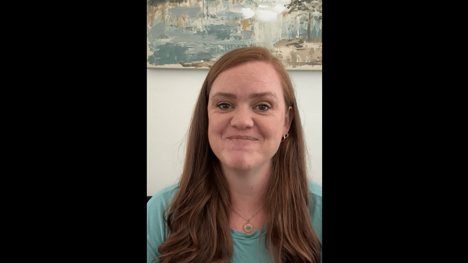Emily Reilly sitting in her office