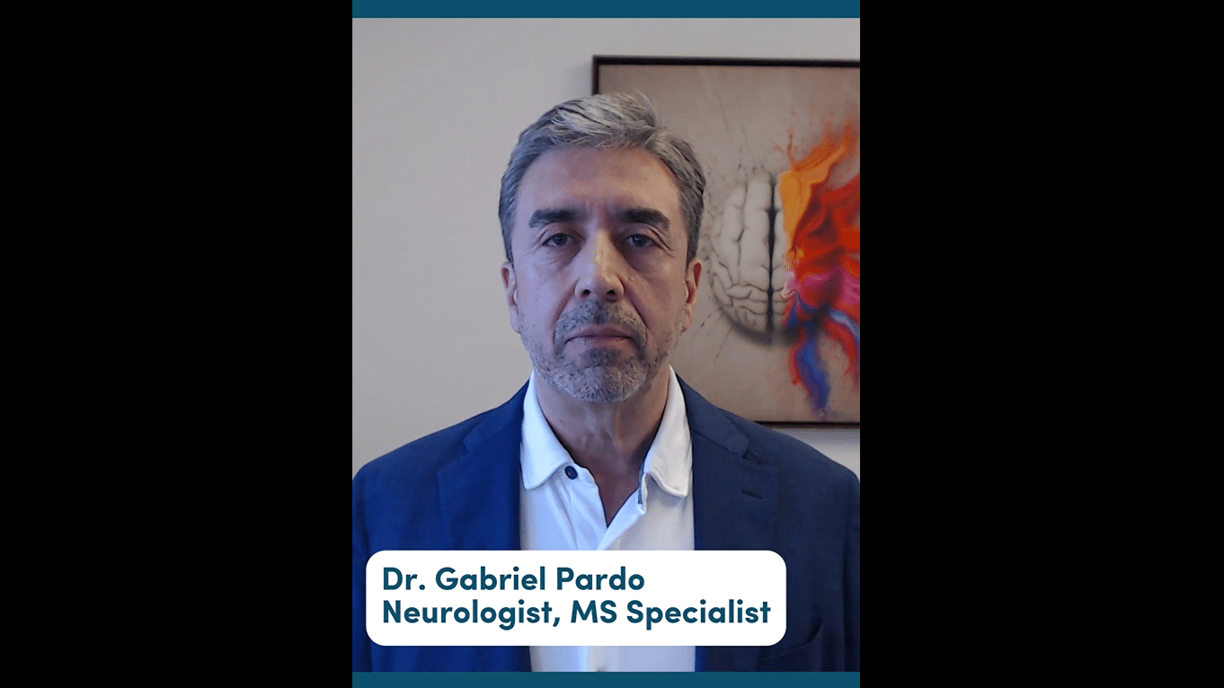 Dr. Pardo sitting in his office.