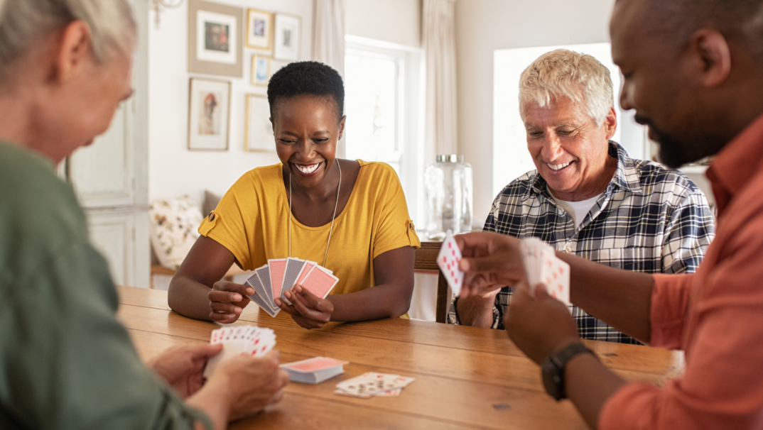 Group of friends playing cards